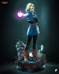 Sculptor's render of the painted design (kit ships unpainted): front view of the blonde fighter with the realistic face holding a glowing pink energy ball, on the rubble base