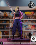 Sculptor's render of the painted design (kit ships unpainted): full front view of the blonde woman standing hand on hip on a cracked asphalt base, a gray segmented serpent spirit coiled behind her with its pronged head over her shoulder