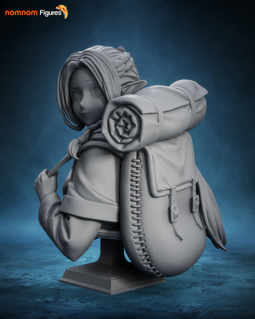 Sculptor's render of the design, shown in gray (kit ships unpainted): bust of the blonde elf mage looking back over her shoulder, the backpack and rolled bedroll on her back, on a square plinth