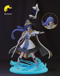 Sculptor's render of the painted design (kit ships unpainted): full front three-quarter view of the braided mage in the witch hat, arm outstretched, on the water splash base, with a round inset showing the hatless head