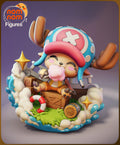 Sculptor's render of the painted design (kit ships unpainted): the little reindeer in a pink and blue hat sitting on a wooden crate eating pink cotton candy, in a boat bow ringed by cream clouds, blue splashes and gold stars