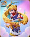 Sculptor's render of the painted design (kit ships unpainted): front view of the chibi heroine making a V sign on a crescent moon, above a jeweled gold brooch and a walking black cat