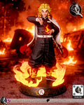 Sculptor's render of the painted design (kit ships unpainted): front view of the flame-haired swordsman drawing his sword, a flame on the blade, on a round wooden base ringed by translucent flames