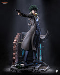 Sculptor's render of the painted design (kit ships unpainted): full front view of the shaggy-haired gunman in a long coat aiming a pistol, in a ruined street corner with a brick-edged wall and glowing cyan conduits