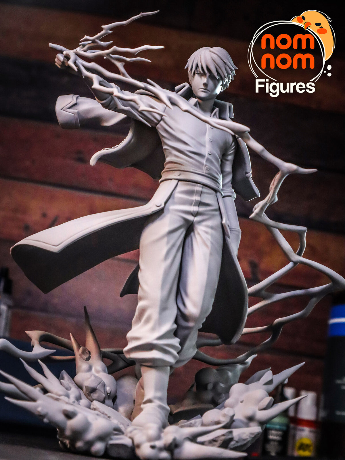 Sculptor's photo of an unpainted print: closer front view from the head to the boots, with the lightning reaching across him