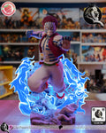 Sculptor's render of the painted design (kit ships unpainted): front view of the striped fighter lunging out of the blue flame ring with the snarling head, over the carved rock pile