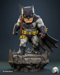 Sculptor's render of the painted design (kit ships unpainted): three-quarter front view with the masked head and the rifle slung on his back, on the broken rock base