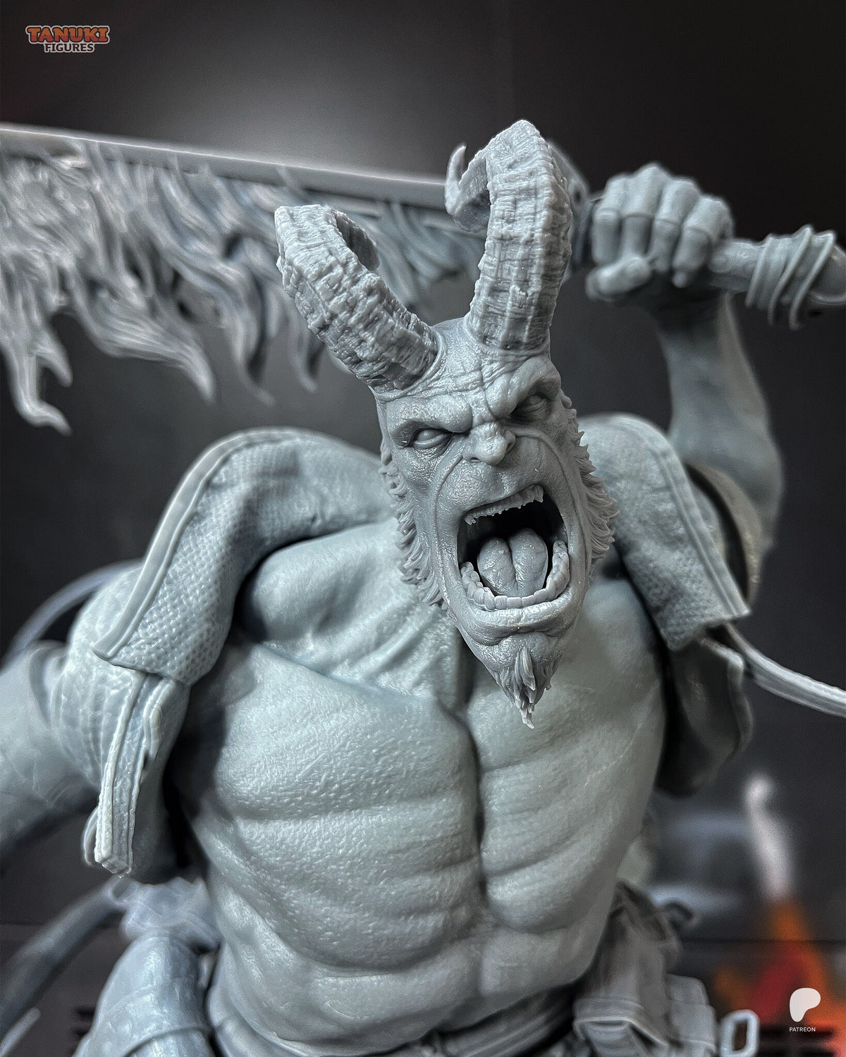 Studio photo of the unpainted test print (kit ships unpainted): close-up of the included head with long ridged curled horns