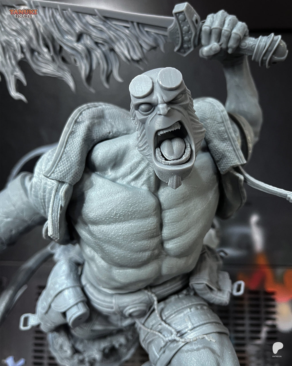 Studio photo of the unpainted test print (kit ships unpainted): close-up of the cartoon-style head with flat horn stumps and round blank eyes