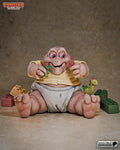 Sculptor's render of the painted design (kit ships unpainted): front view of the baby dinosaur sitting with his legs splayed, a toy dinosaur in each fist, with toy bricks and a plush dino around him