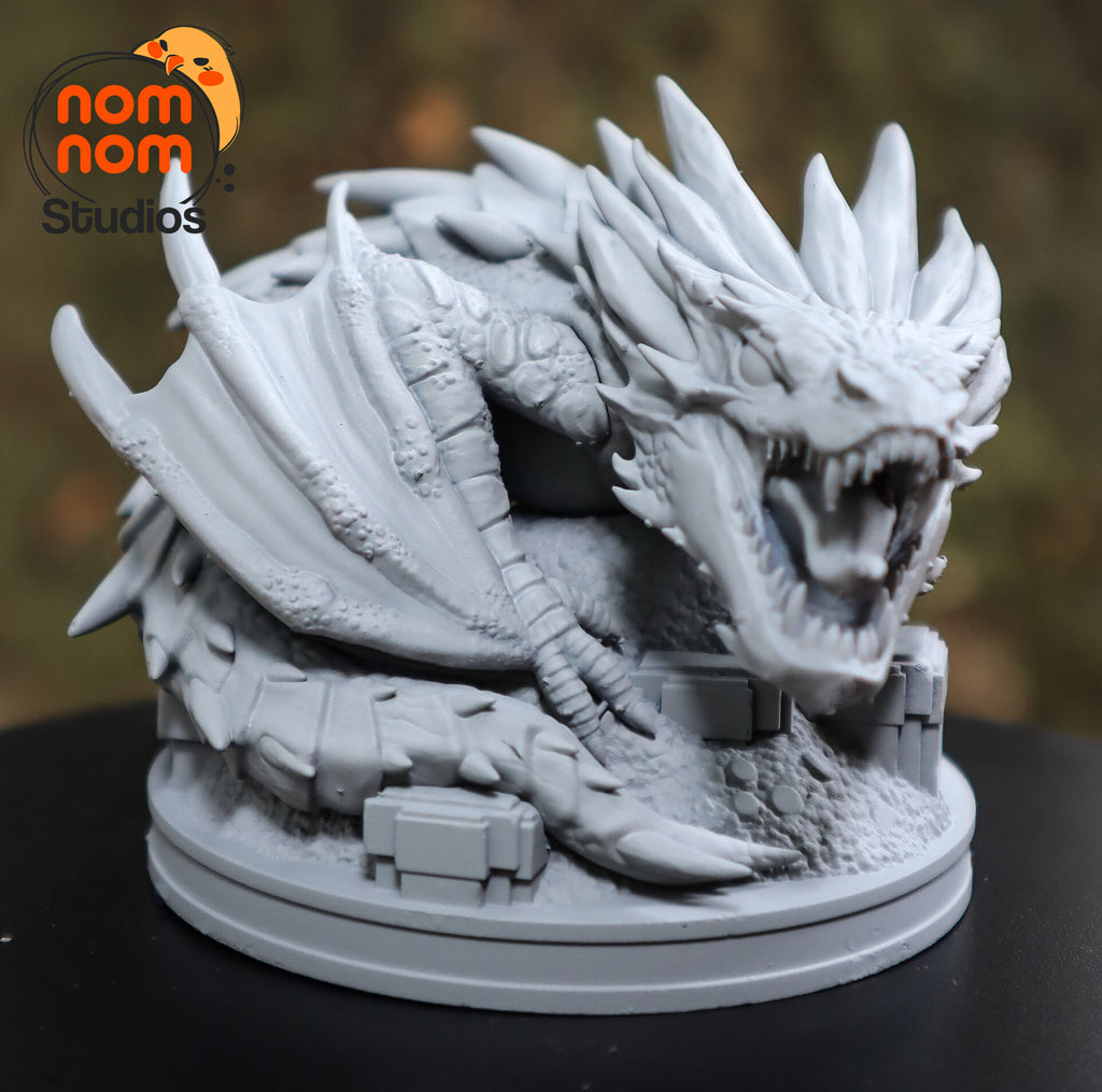 Sculptor's photo of an unpainted print: front three-quarter view looking into the open jaws, the crest fanned out behind