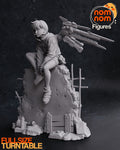 Sculptor's render of the design, shown in gray (kit ships unpainted): the girl seated on top of a broken concrete wall, one knee pulled up, a mechanical wing sweeping out behind her, with a plank barricade, spray cans and rebar at the foot of the wall