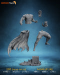 Studio scale and parts sheet (kit ships unpainted): the studio's sizes for this design, the miniature at 84 mm tall, 56 mm wide and 74 mm long, beside the larger 1:10 version, whose parts are the ones laid out