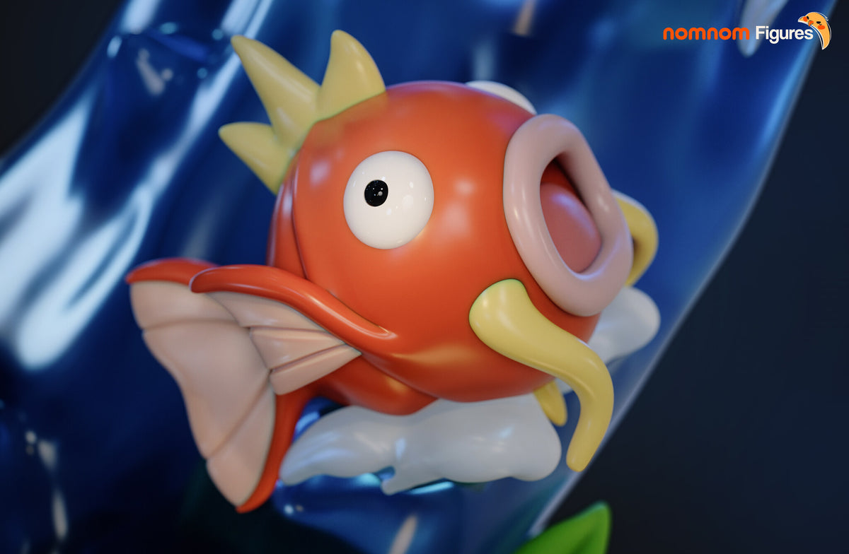 Sculptor's render (kit ships unpainted): close-up of the round orange fish with yellow fins and an open mouth, resting on foam