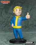 Sculptor's render of the painted design (kit ships unpainted): full front view of the winking mascot in a blue and yellow jumpsuit giving a thumbs up on a round black gear base